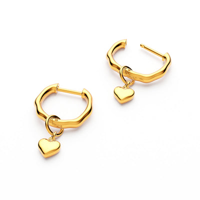 Lot de boucles d'oreilles cœur en fusion et topaze blanche (or)
