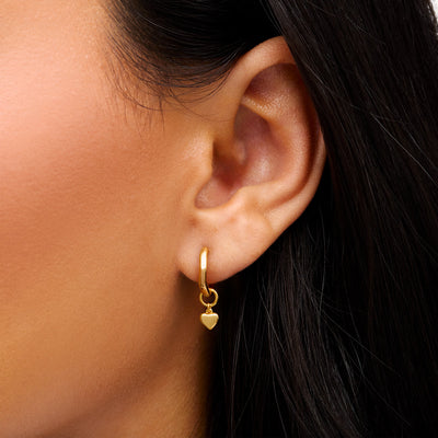 Lot de boucles d'oreilles cœur en fusion et topaze blanche (or)