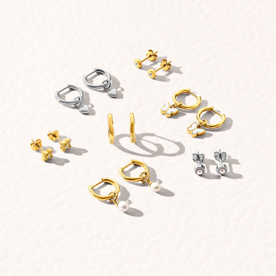 Lot de boucles d'oreilles cœur en fusion et topaze blanche (or)